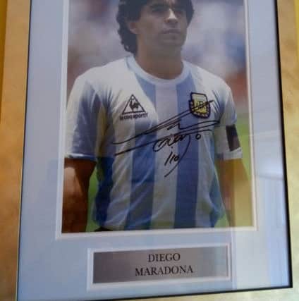 A signed photo of Diego Maradona