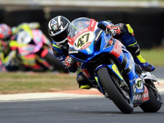Richard Cooper won the opening Superbike race at the Sunflower Trophy races on Friday.