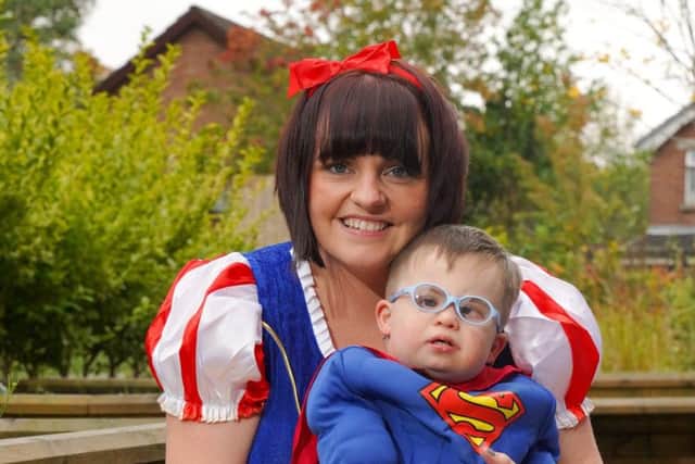 Proud Mum Lisa Allen, from Lisburn, and her own little hero, son Aaron (aged 3).