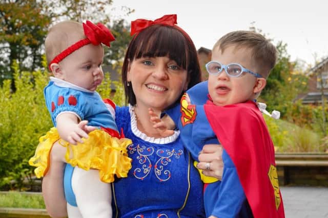 Proud Mum Lisa Allen, from Lisburn, daughter Rebecca (aged 6 months) and her own little hero, son Aaron (aged 3) walked for Mencap NI last weekend.   Photo by Aaron McCracken