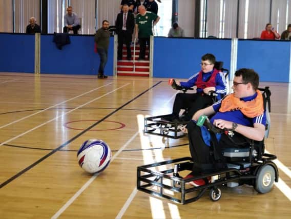 Northern Ireland Powerchair football squad members training for the European Championships in their new Strikeforce chairs.