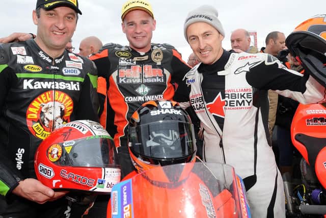 Race winner Ryan Farquhar, runner-up Jeremy McWilliams (right) and Michael Rutter secured a KMR Kawasaki podium clean sweep in the first ever Supertwin race at the North West 200 in 2012.