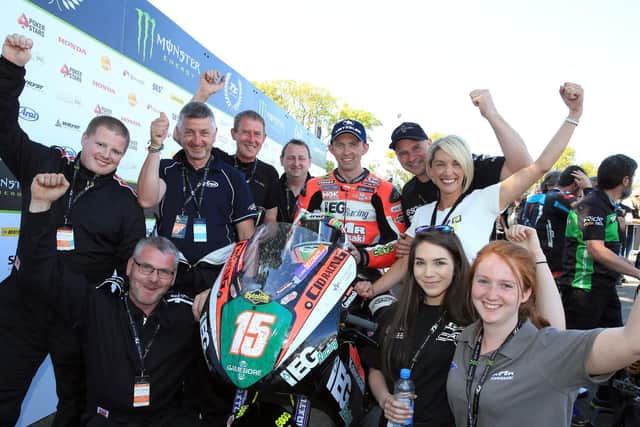 Mullingar man Derek McGee celebrates his runner-up finish in the Lightweight race at the Isle of Man TT in June with the KMR Kawasaki team.