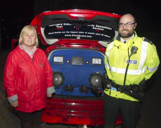 Causeway Coast & Glens Councillor and Chair of PCSP Cllr Margaret Ann McKillop, pictured with Const Ryan McKenna at Waterfoot on Thursday night.