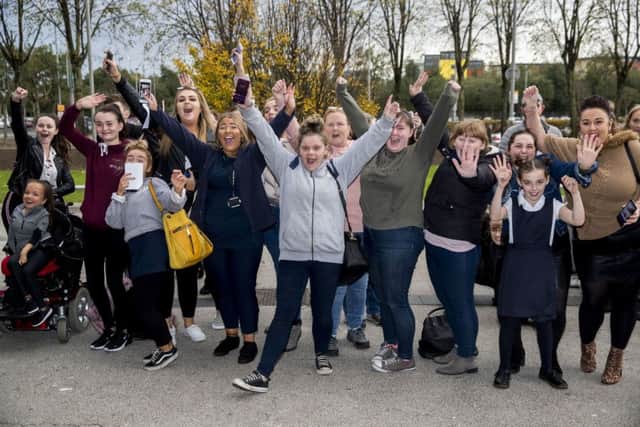 Westlife fans await the band's arrival at the Belfast SSE Arena, ahead of the press conference for tickets going on sale for their reunion tour. Pic by Liam McBurney/PA Wire
