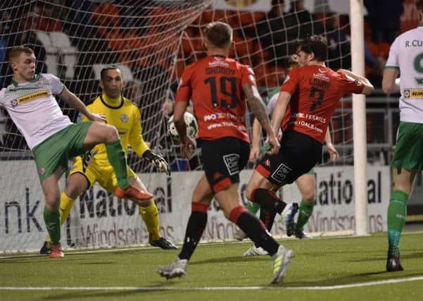 Philip Lowry finds the net in Crusaders' Toals County Antrim Shield quarter-final win over Cliftonville. Pic by INPHO.