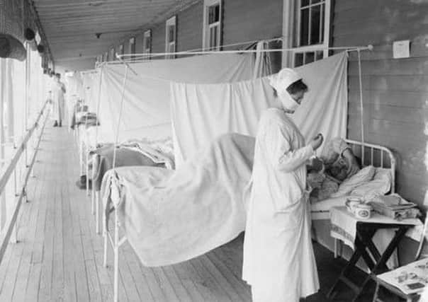 Patients receive care for the Spanish flu at Walter Reed Military Hospital in Washington