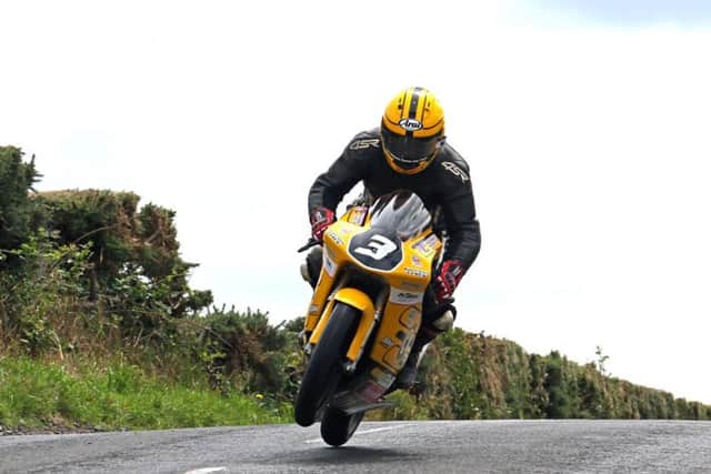 Gary Dunlop on the Joey's Bar Racing Honda during practice at the Armoy Road Races.