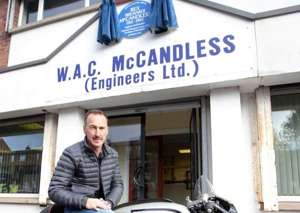 Race ace Jeremy McWilliams unveiled the memorial to Rex McCandless at the McCandless engineering works on Belfast's Limestone Road