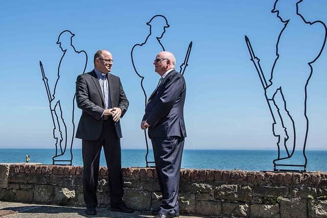 Councillor Billy Ashe (right) and Rev Alan McCann with the Ghost Tommies in the shadow of Carrickfergus Castle