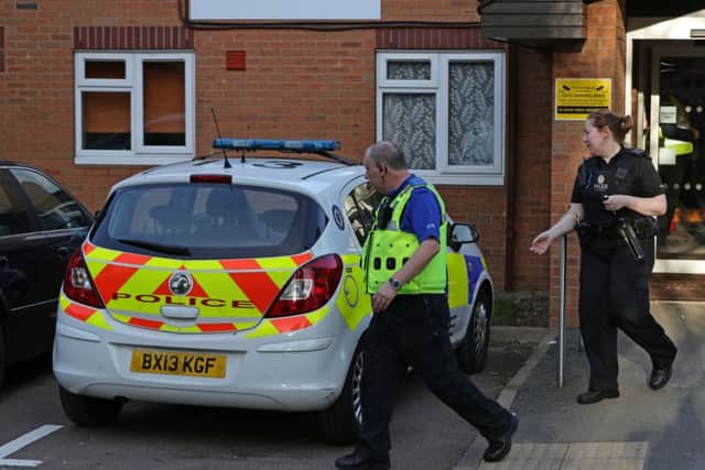 Officers from West Midlands Police leave a sheltered retirement housing block in Yardley Wood, Birmingham after speaking to David Mesher, who allegedly launched a a racist tirade against a woman on a Ryanair flight. PRESS ASSOCIATION Photo.