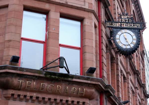 The Belfast Telegraph clock on the side of the building, pictured the morning of the fire