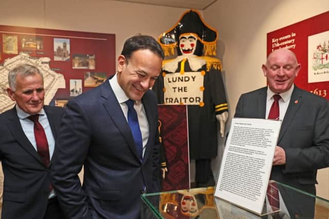 Taoiseach Leo Varadkar (centre) with General Secretary of the Apprentice Boys of Derry William Moore (right) during his visit to the organisation's memorial hall in Londonderry. Pic: Brian Lawless/PA Wire