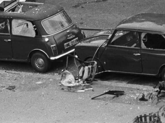 File photo dated 20/07/82 of the scene following an IRA car bomb blast in Hyde Park, London, which killed four Royal Household Cavalrymen and seven horses, as they rode through the central London park to attend the Changing of the Guard.