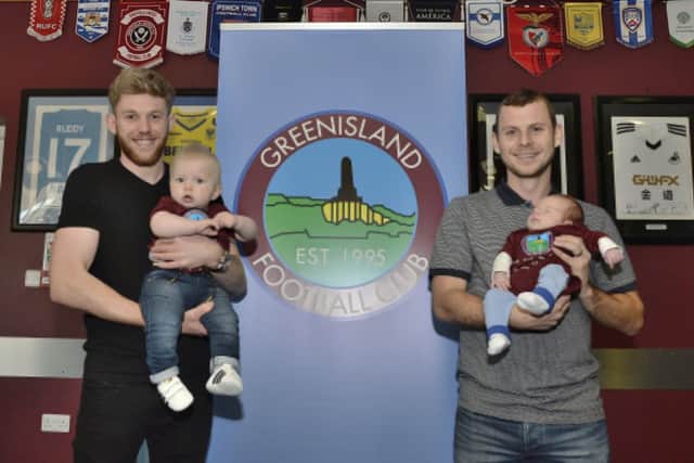 First of the new arrivals Saul Greer with dad Ryan and the latest Sam Kerby with dad Alan.