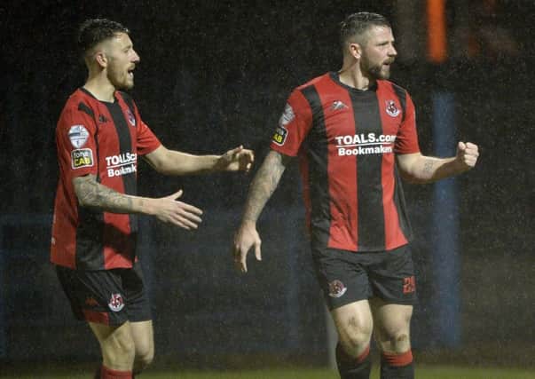 Rory Patterson celebrates breaking the deadlock for Crusaders against Newry City AFC. Pic by INPHO.