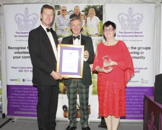 Nicholas Lowry (Chair) and Ruth Montgomery BEM (Secretary) of the Clogher Valley Agriculture Society receives the Queens Award for Voluntary Service from the Lord Lieutenant of Tyrone Robert Scott OBE  on behalf of the Society at their Gala Ball celebrating their 100th show in the Valley Hotel, Fivemiletown