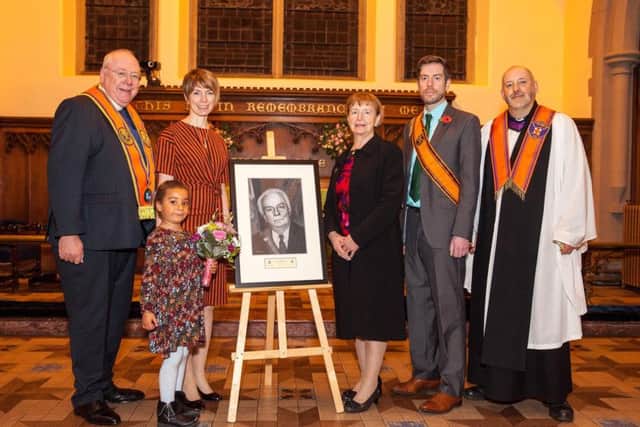 Rev Mervyn Gibson, Orange Order grand secretary; Ellie Mae Donnelly; Alison Laird Donnelly; Lady Laird; David Laird and Rev Iain Jameson, assistant grand chaplain, at the thanksgiving service
