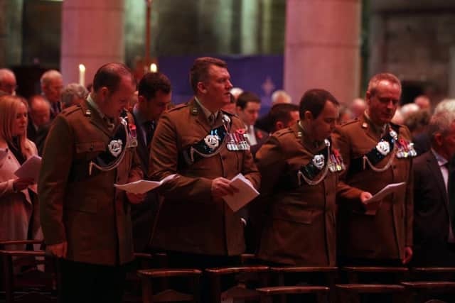 Military personnel, veterans and family members gathered at St Anne's Cathedral for the Royal Irish Regiment's annual service of remembrance. Pic by Matt Bohill, Pacemaker
