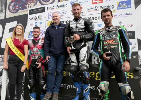 Pictured are the winners of the First4Printing Super Sport Race, one of two races that took place on Friday 27th July, as part of the Armoy Road Races 10th anniversary. From left to right, Miss Armoy 2018, Lauren Trotter, Road Racer runner up Adam McLean, First4Printing Chris Atchison with winner Paul Jordan and in third place, Michael Sweeney.