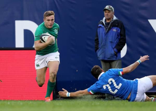 Jordan Larmour scores his third and Ireland's eight try against Italy