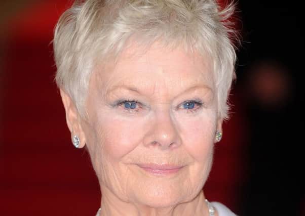 23/10/2012 PA File photo of Dame Judi Dench arriving at the Royal World premiere of Skyfall at the Royal Albert Hall, London. See PA Feature HEALTH Macular. Picture credit should read: Dominic Lipinski/PA Photos. WARNING: This picture must only be used to accompany PA Feature HEALTH Macular.