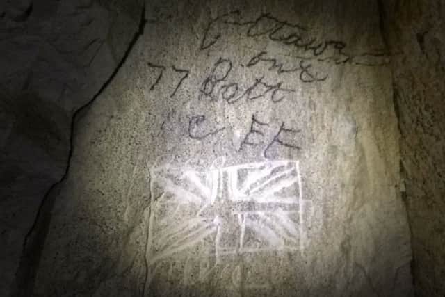 Grafitti in the Somme battlefield tunnels at Les Muches de Bouzincourt near Albert
