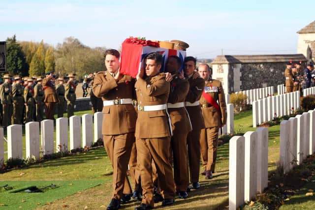 The coffin of an unknown British soldier arrives Tyne Cot Cemetery near Ypres, Belgium. Photo: Gareth Fuller/PA Wire
