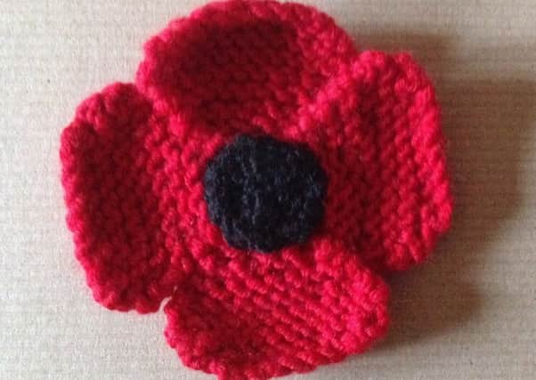A knitted poppy