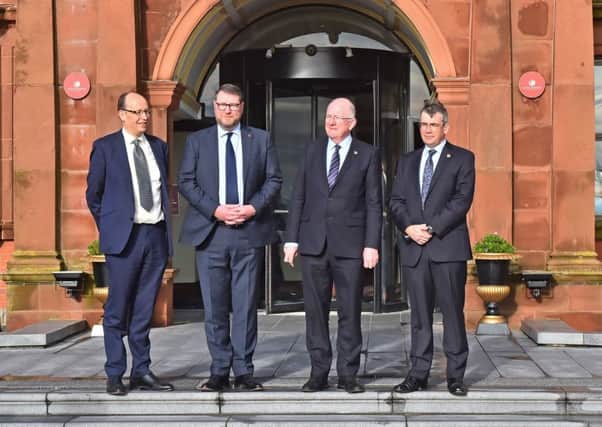 Peter May, Permanent Secretary Department of Justice; PSNI Deputy Chief Constable Stephen Martin; Minister Charlie Flanagan TD, Department of Justice and Equality; and Drew Harris, Chief Commissoner of An Garda SiochÃ¡na at the cross border organised crime conference. Photo by Simon Graham.