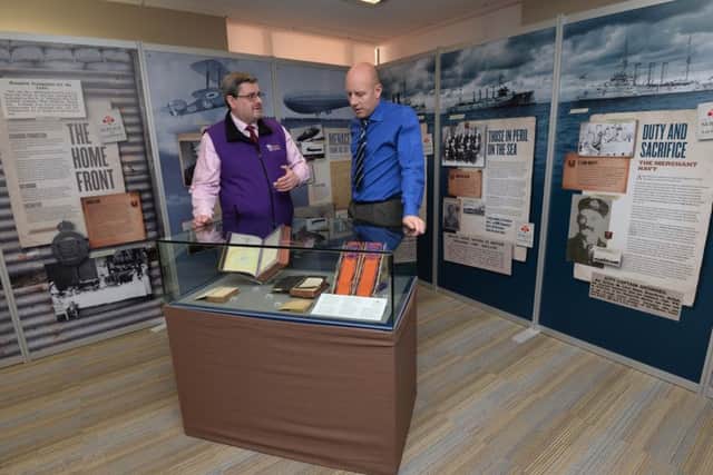 Jonathan Mattison (Curator at Museum of Orange Heritage) gives News Letter reporter Graeme Cousins a tour of the exhibition.
 Pic Colm Lenaghan/Pacemaker
