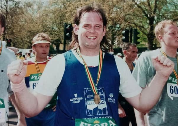 At the finish line of the London Marathon in 1997