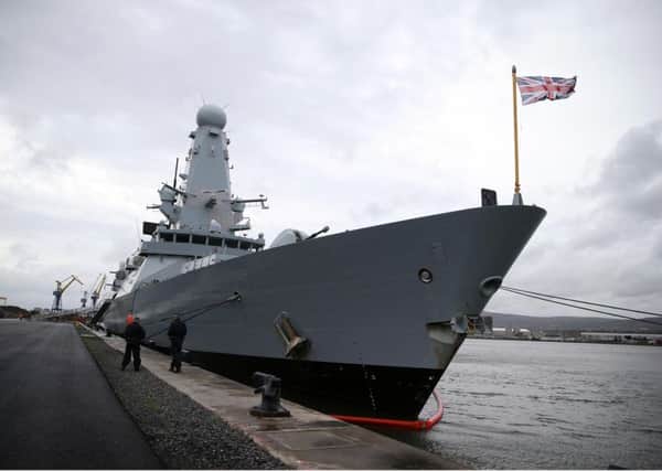 Royal Navy warship HMS Duncan, pictured on Friday, docks in Belfast for the weekend