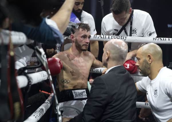 Ryan Burnett reacts in his corner after losing to Nonito Donaire during their WBA World Championship bout at The SSE Hydro