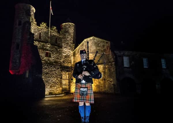 Piper Darren Robinson of Killadeas Pipe Band plays 'When the Battle's O'er' during a dawn Armistice Day ceremony at Enniskillen Castle in Co Fermanagh, Northern Ireland, on the 100th anniversary of the signing of the Armistice which marked the end of the First World War. A radio operator in Enniskillen received a message about the Armistice hours before many other parts of the UK.