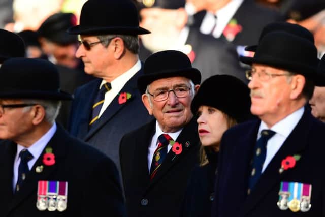 Veterans attend the remembrance service at the Cenotaph memorial in Whitehall, central London, on the 100th anniversary of the signing of the Armistice which marked the end of the First World War. PRESS ASSOCIATION Photo. Picture date: Sunday November 11, 2018.