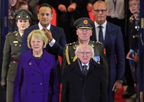 President Michael D Higgins, accompanied by his wife Sabina, Taoiseach Leo Varadkar and Tanaiste Simon Coveney, reviews members of the Defence Forces at Dublin Castle after being inaugurated as president for a second term