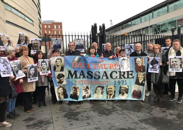 Families of the 10 Ballymurphy dead outside the Laganside court complex before the inquest began