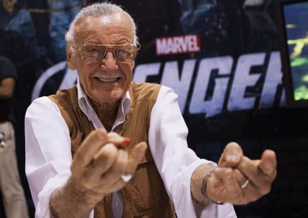 Legendary comic book creator Stan Lee mimics Spiderman as he celebrated 50 years of the comic book character at the Fan Expo convention in Toronto in 2012. (AP Photo/The Canadian Press, Michelle Siu)