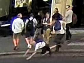 BEST QUALITY AVAILABLE Undated handout CCTV image issued by the City of London police of a man with a rucksack (right) pushing another man in front of oncoming traffic whilst walking on the east pavement of New Bridge Street northbound at around 08.00 on the morning of 23 July 2018.