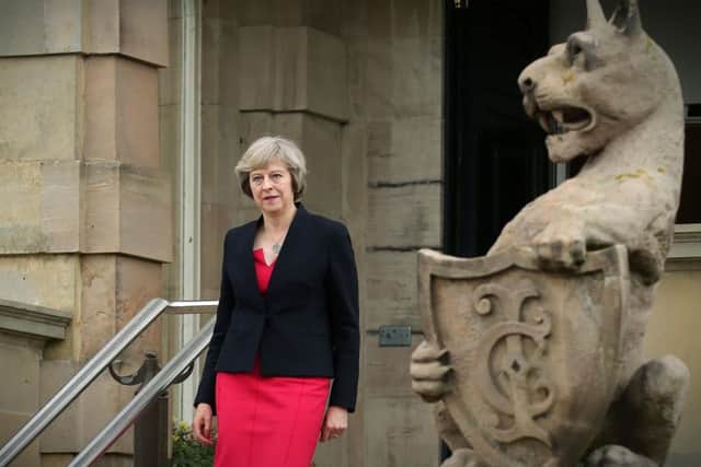 The letter-writer says Theresa May, who favoured Remain in 2016 (and is pictured here in Belfast soon after taking office the month after the referendum), has always intended to thwart a proper Brexit