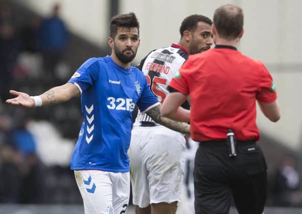 Rangers' Daniel Candeias pleads his case as he gets sent off during the Ladbrokes Scottish Premier League match at St Mirren Park in November. Pic by PA.