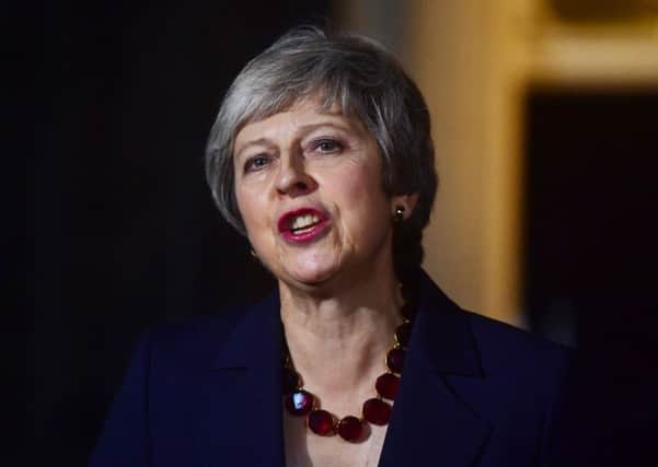 Prime Minister Theresa May makes a statement outside 10 Downing Street, London, confirming that Cabinet has agreed the draft Brexit withdrawal agreement. PRESS ASSOCIATION Photo. Picture date: Wednesday November 14, 2018. See PA story POLITICS Brexit. Photo credit should read: Victoria Jones/PA Wire