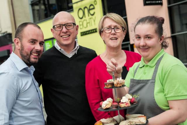 The Building Better Futures fund has provided 850K to 36 groups across Northern Ireland, including the One Eighty Restaurant in Portadown which was facing closure.  Pictured with trainee Joanna are Nigel Hampton, Director, Step by Step, Nigel McKinney, Director of Operations, Building Change Trust, and Paula Reynolds, CEO, Belfast Charitable Society.