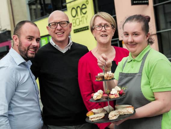 The Building Better Futures fund has provided 850K to 36 groups across Northern Ireland, including the One Eighty Restaurant in Portadown which was facing closure.  Pictured with trainee Joanna are Nigel Hampton, Director, Step by Step, Nigel McKinney, Director of Operations, Building Change Trust, and Paula Reynolds, CEO, Belfast Charitable Society.