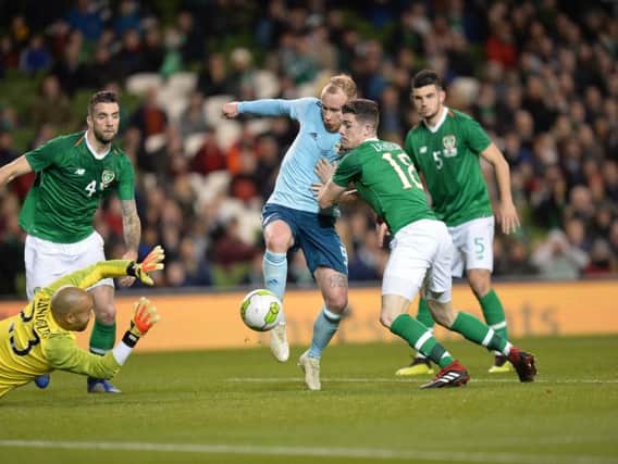 Northern Ireland's Liam Boyce has an attempt on goal