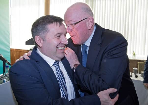 Ulster Unionist leader Robin Swann (left) with Fine Gael Minister for Justice and Equality Charlie Flanagan, during the Fine Gael Ard Fheis, City West Hotel in Dublin, Ireland.