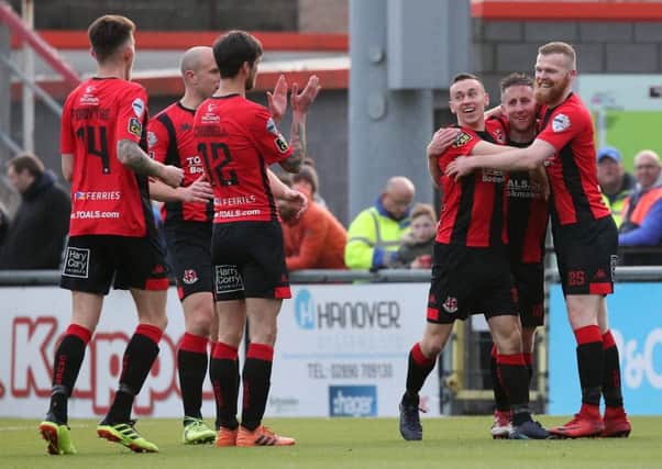 Celebration time for Crusaders against Glenavon. Pic by Pacemaker.