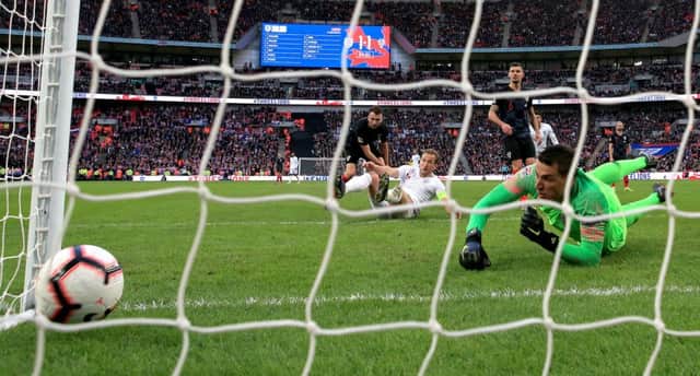 England's Harry Kane (centre) scores his side's second goal of the game during the UEFA Nations League, Group A4 match at Wembley Stadium, London. (Photo: Nick Potts/PA Wire.)