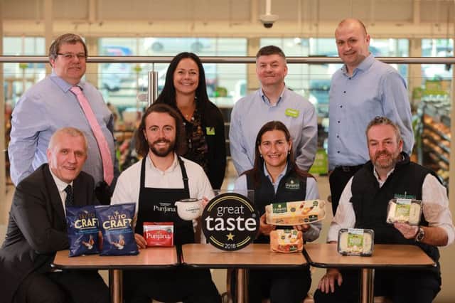 Senior Buying Manager Local Food at Asda, Michael McCallion; VP Commercial Execution at Asda, Tracey Ford; Asda Antrim General Store Manager, Robert Ryans; and Senior Director Northern Ireland at Asda, George Rankin. Front Row, L-R: Robert Brown from Tayto; Jamie Thompson from Thompsons Tea; Eileen Hall from Cavanagh Free Range Eggs; and Mervyn Jones from Mash Direct.